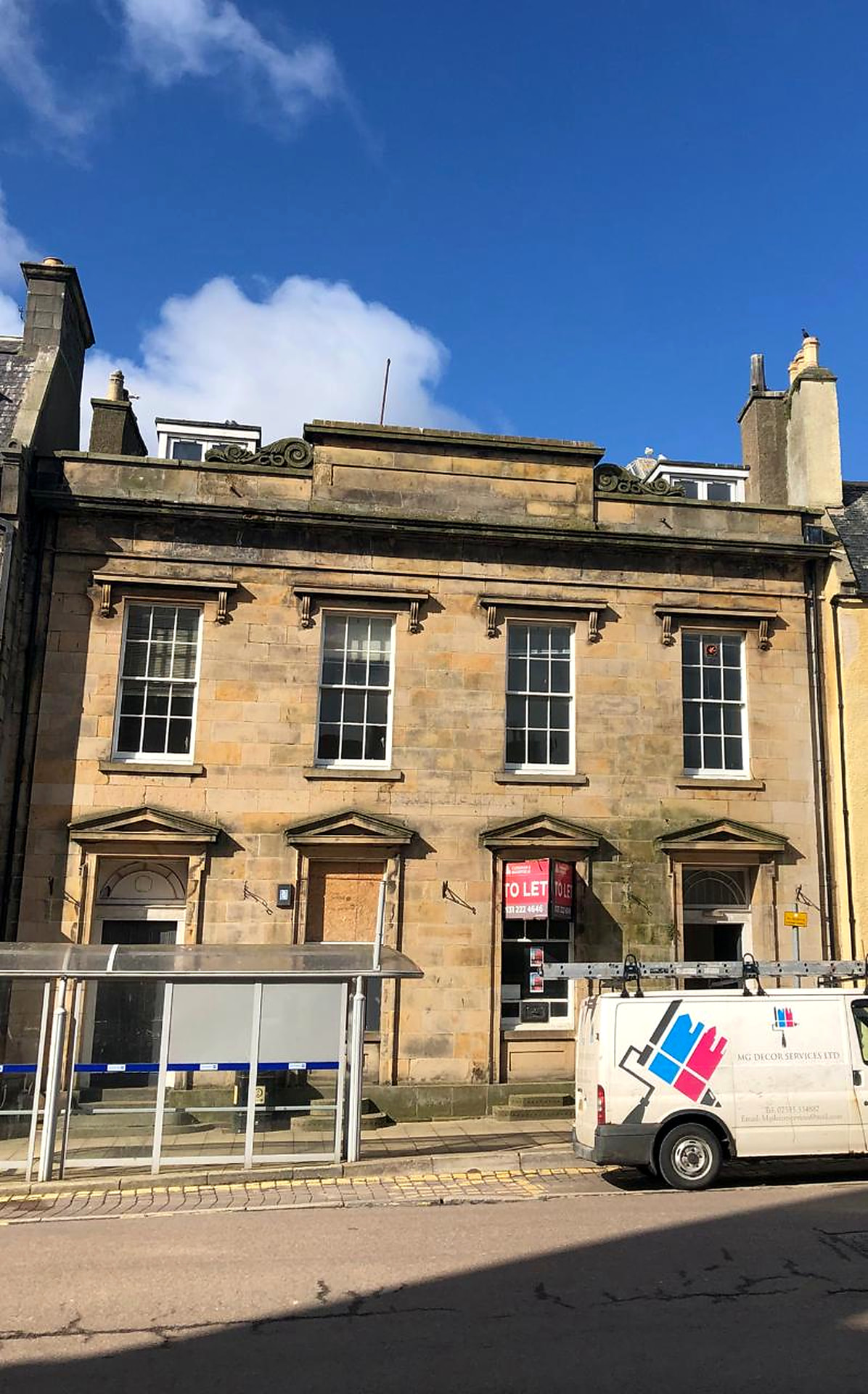 Front elevation of the former Clydesdale Bank, Banff, in direct sunlight